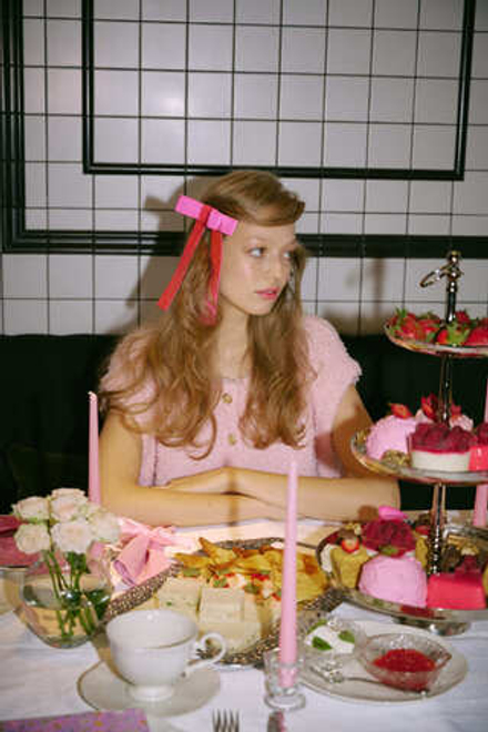 Розовый бант из шелка