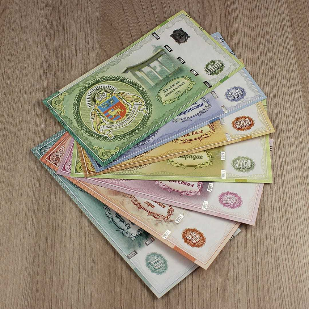 Набор из 7 сувенирных банкнот "Крым" в тематическом альбоме