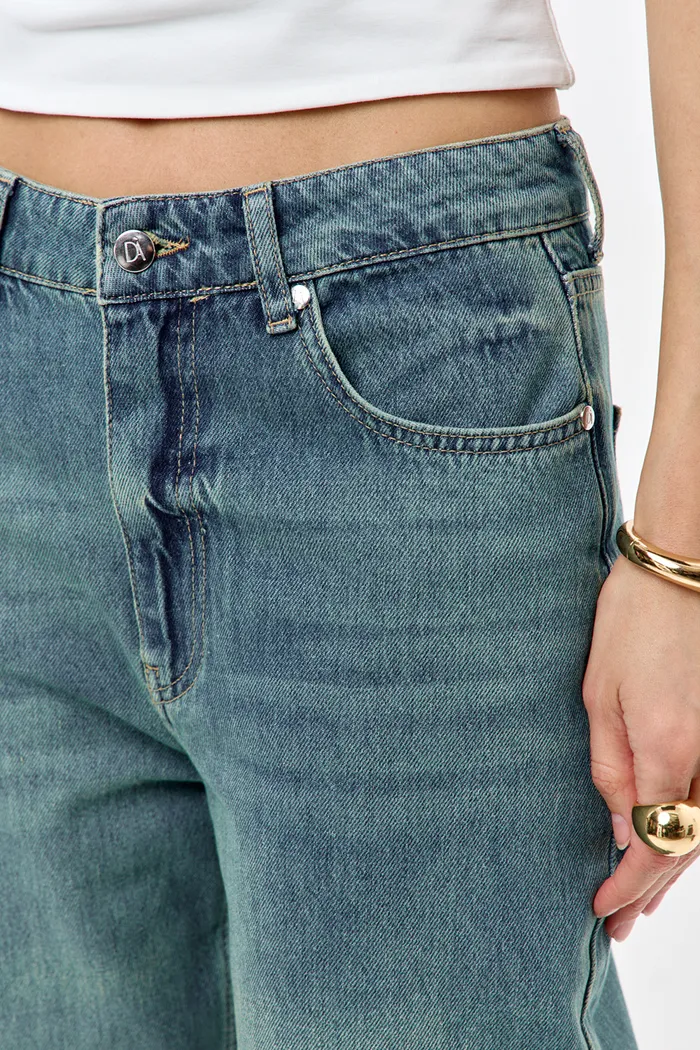 Джинсы wide leg с потертостями сине-зеленого цвета