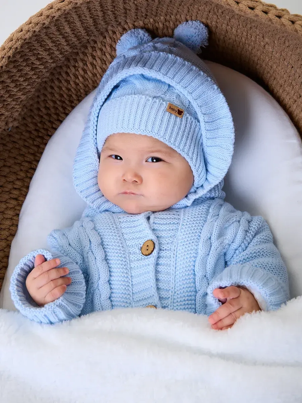 Вязаный конверт на выписку для новорожденного теплый