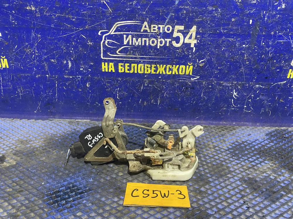 Замок двери задней левой MITSUBISHI LANCER CEDIA 2000
