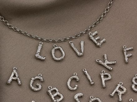 Подвески буквы в ассортименте серебро 9мм