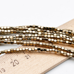 Гематит Куб бусины (имитация), цвет золотистый, размер около 2 мм, цена за отрезок 19 см (1/2 нити)