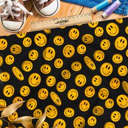 Ткань флис яркие смайлики на чёрном фоне