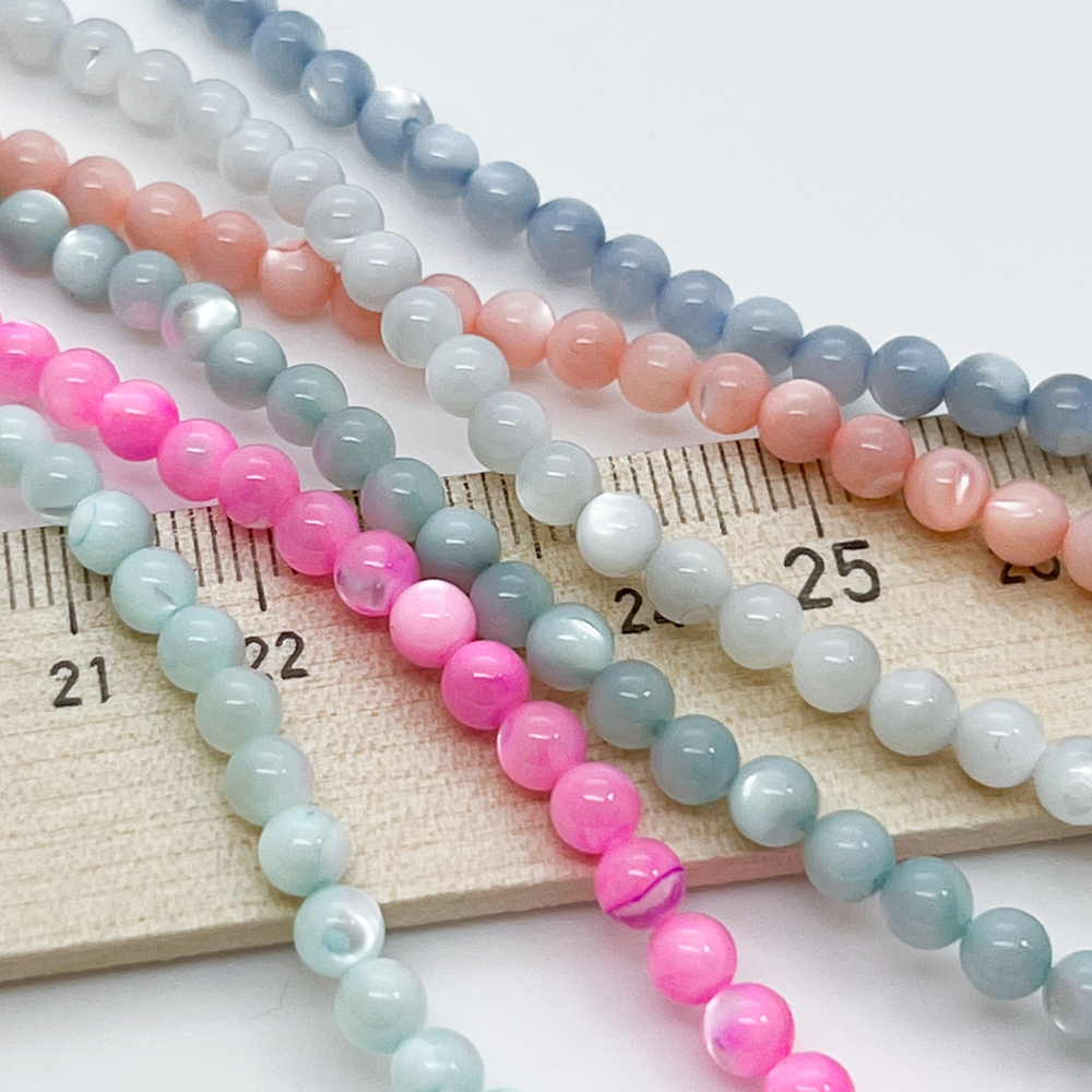 Перламутр тонированный, цвет голубой, диаметр 4,5 мм, цена за 44-45 шт (1/2 нити)