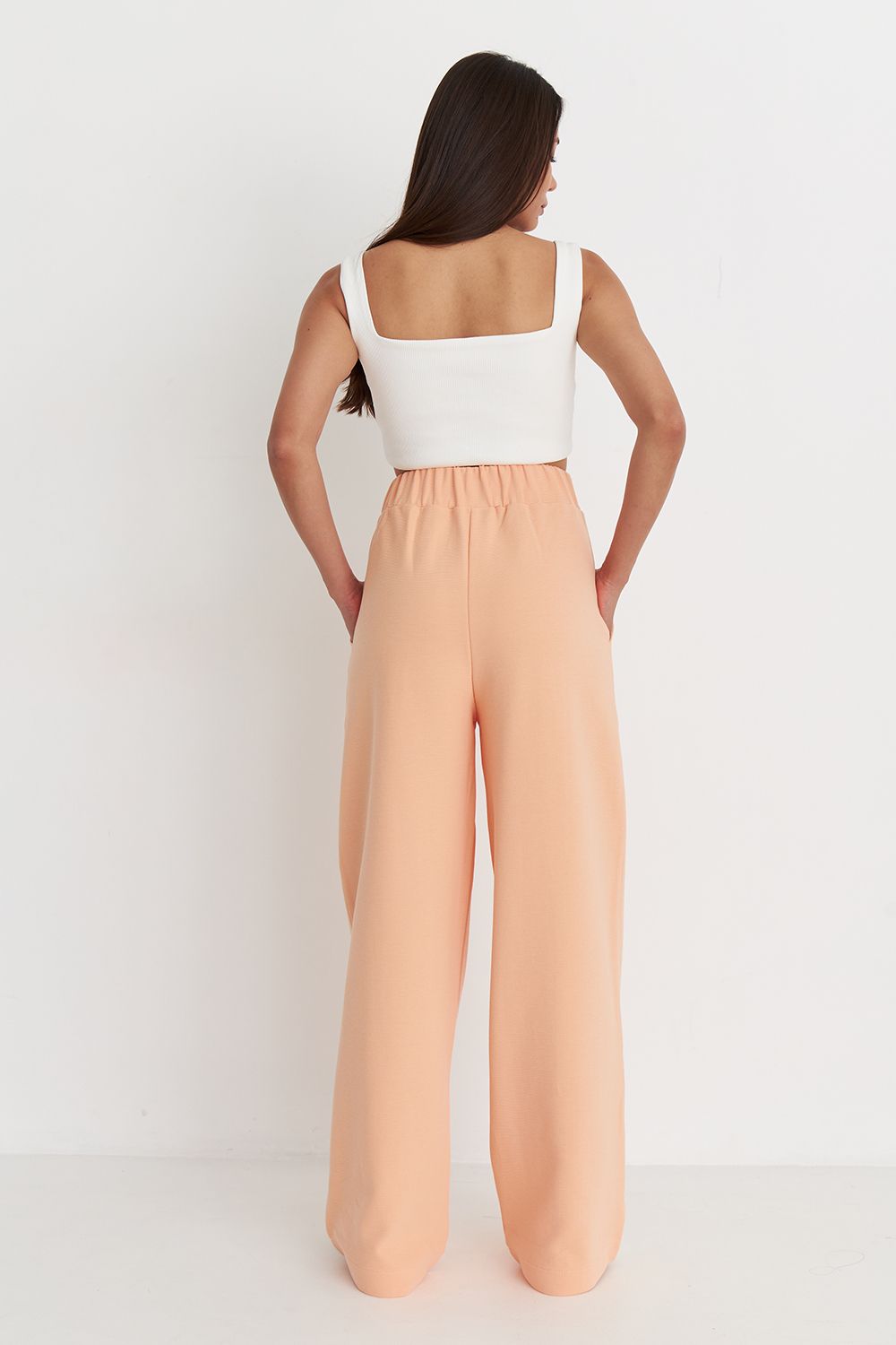 Брюки прямого кроя из рифленого хлопка цвета персик