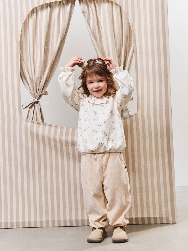 Блузка с рюшей 