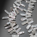 Жемчуг культивированный Бива, белый, с боковым отверстием 19-30*9-10мм