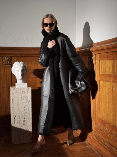 Длинная двусторонняя шуба из овчины