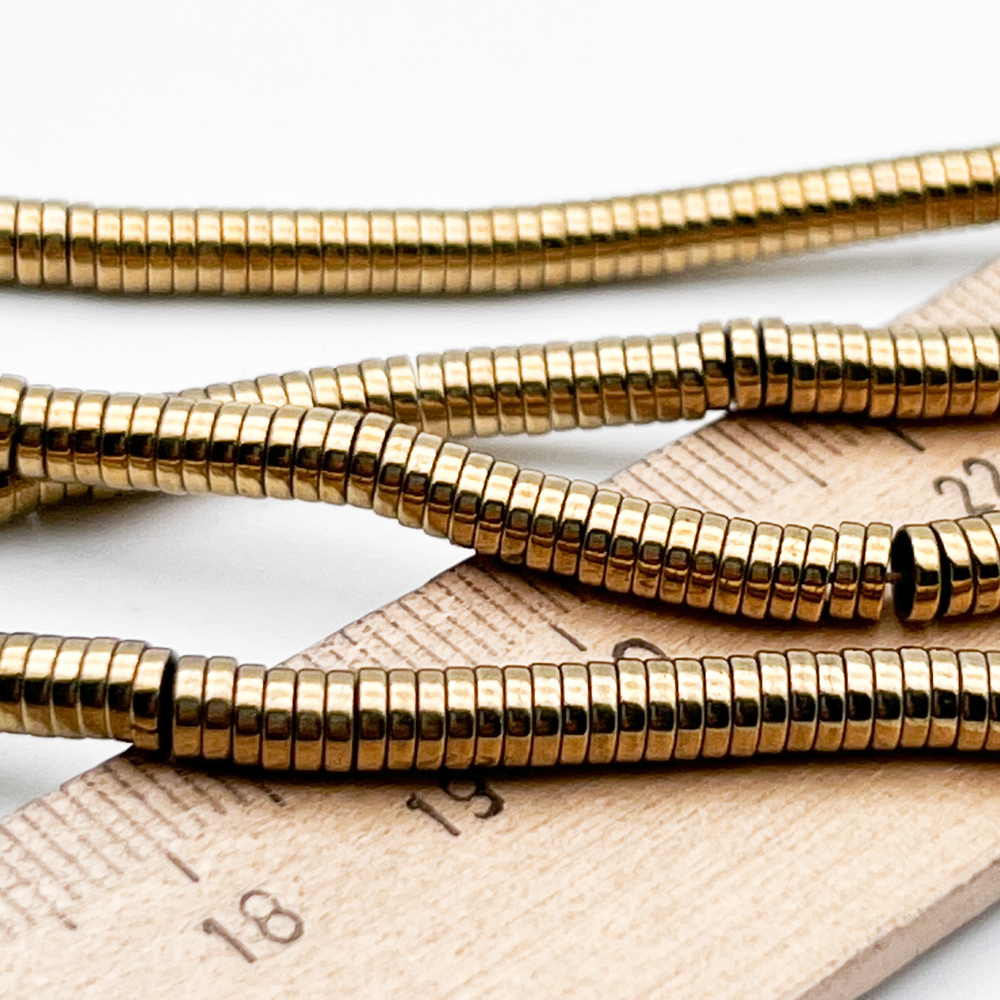 Гематит Рондель бусины (имитация), цвет темно-золотистый, размер около 1*4 мм, цена за отрезок 19 см (1/2 нити)