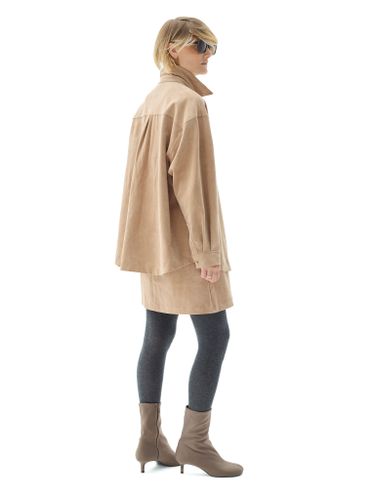 Бежевая рубашка из эко-замши