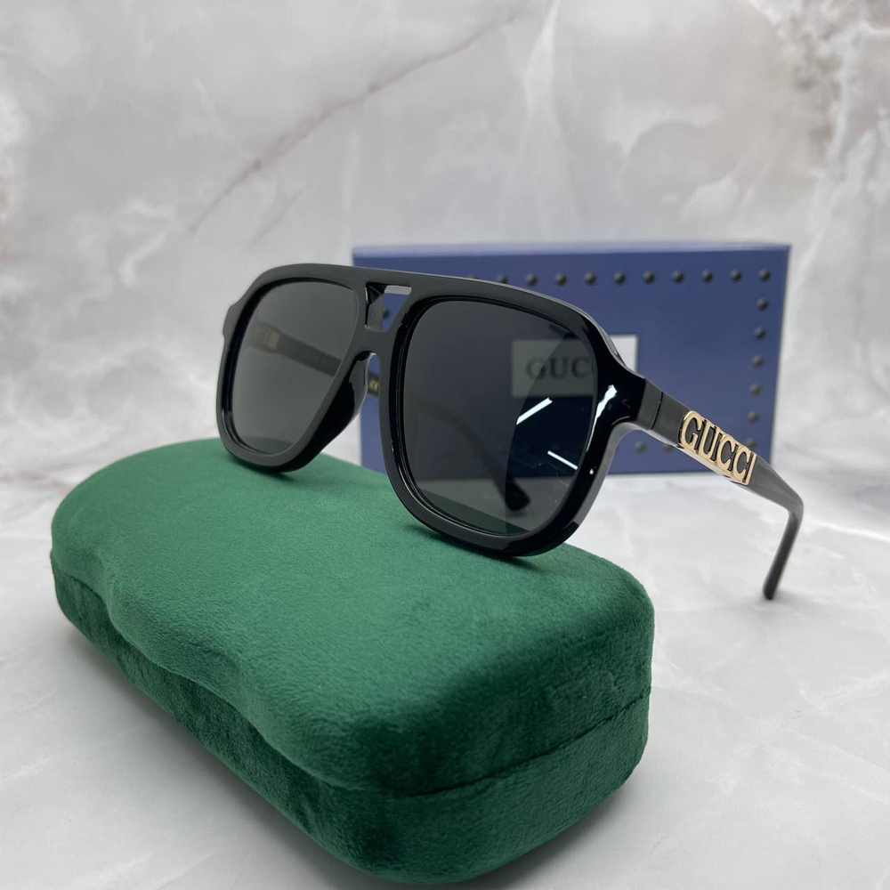 Солнцезащитные очки Gucci