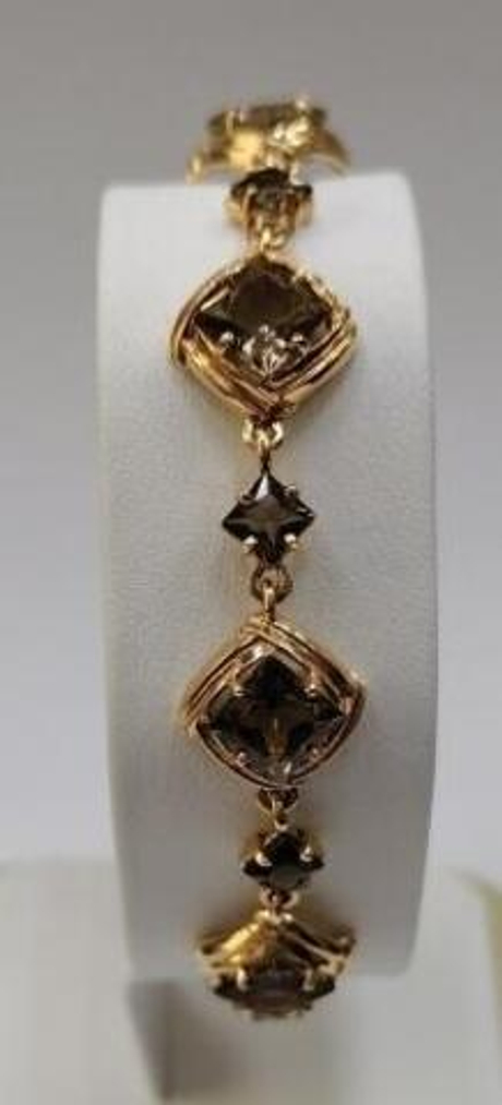 Браслет из золота с раух-топазами