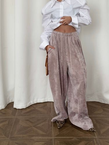 Светло-бежевые широкие брюки из велюра