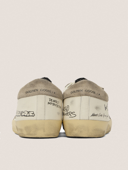 Super Star in white leather with contrasting decorative lettering