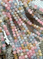 Нить бусин из тонированного кварца 8,5мм, гладкие