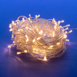 ULD-S1000-100-DTA WARM WHITE IP20 Гирлянда светодиодная. 10м. 100 светодиодов. Теплый белый свет. Провод прозрачный. ТМ Uniel