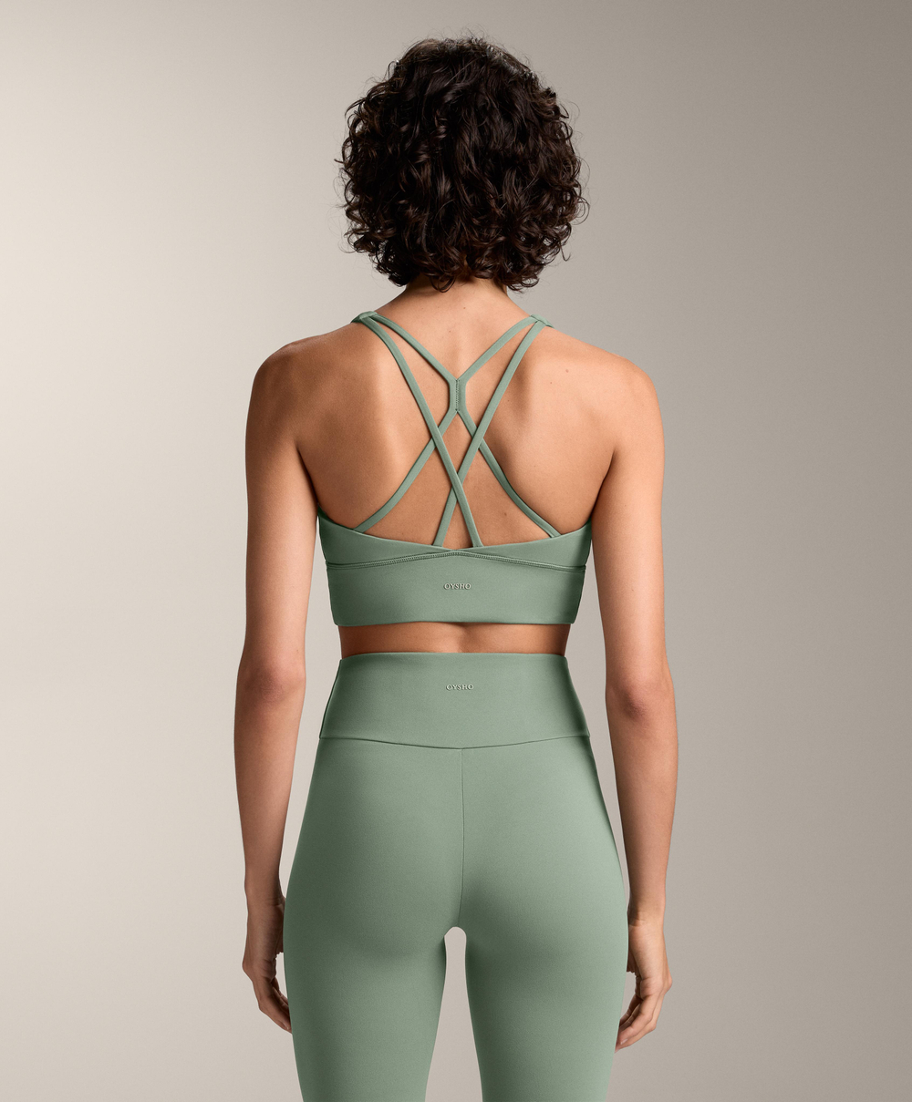 Oysho Спортивный бюстгальтер с бретелями на спине, бледно-зеленый