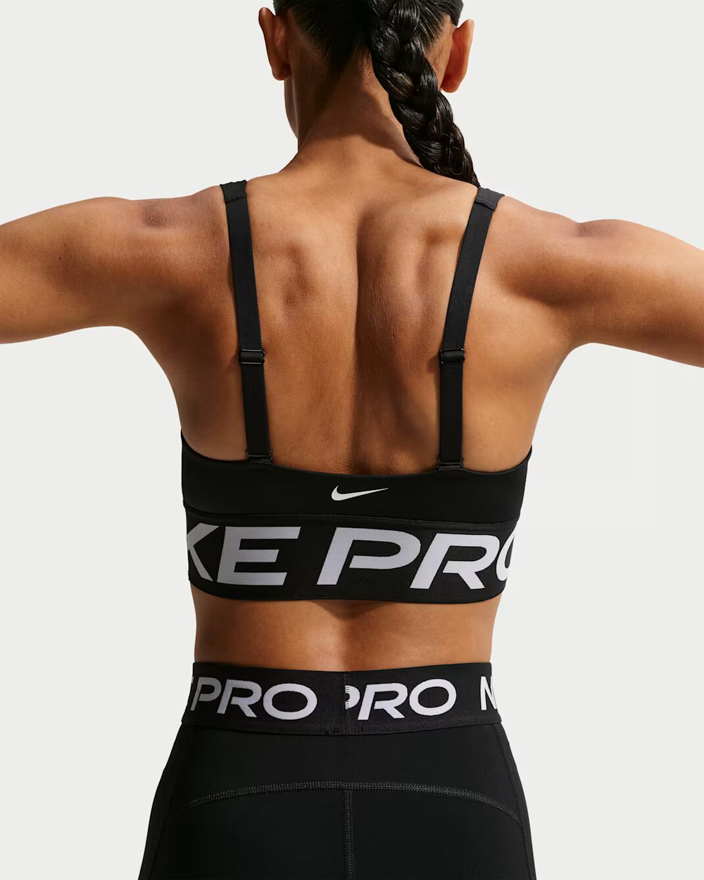 Nike Pro Indy Plunge Женский спортивный бюстгальтер со средней поддержкой и вставками - NIKE