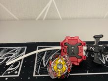 Волчок и лаунчер Legend Spriggan 7 Merge B86 от Takara Tomy