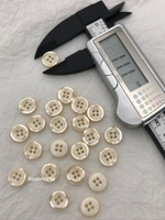 Пуговицы на прокол молочные с бежевой окантовкой