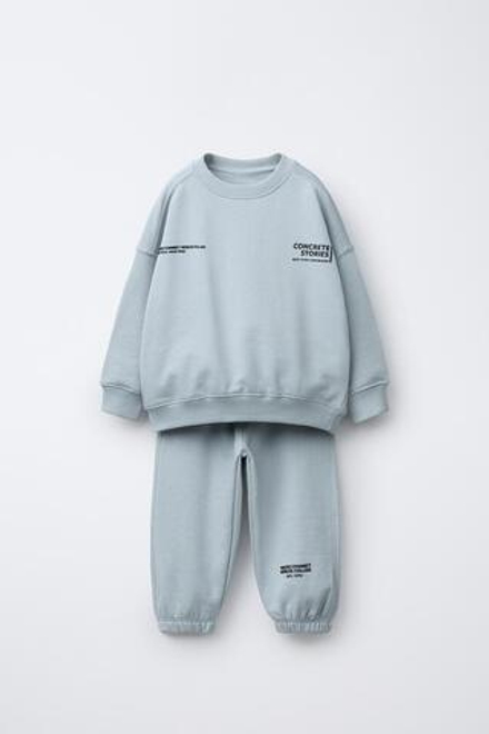 ZARA КОМПЛЕКТ ДЛЯ БЕГА, ТОЛСТОВКА И БРЮКИ-ДЖОГГЕРЫ С ТЕКСТОМ, ГОЛУБОЙ