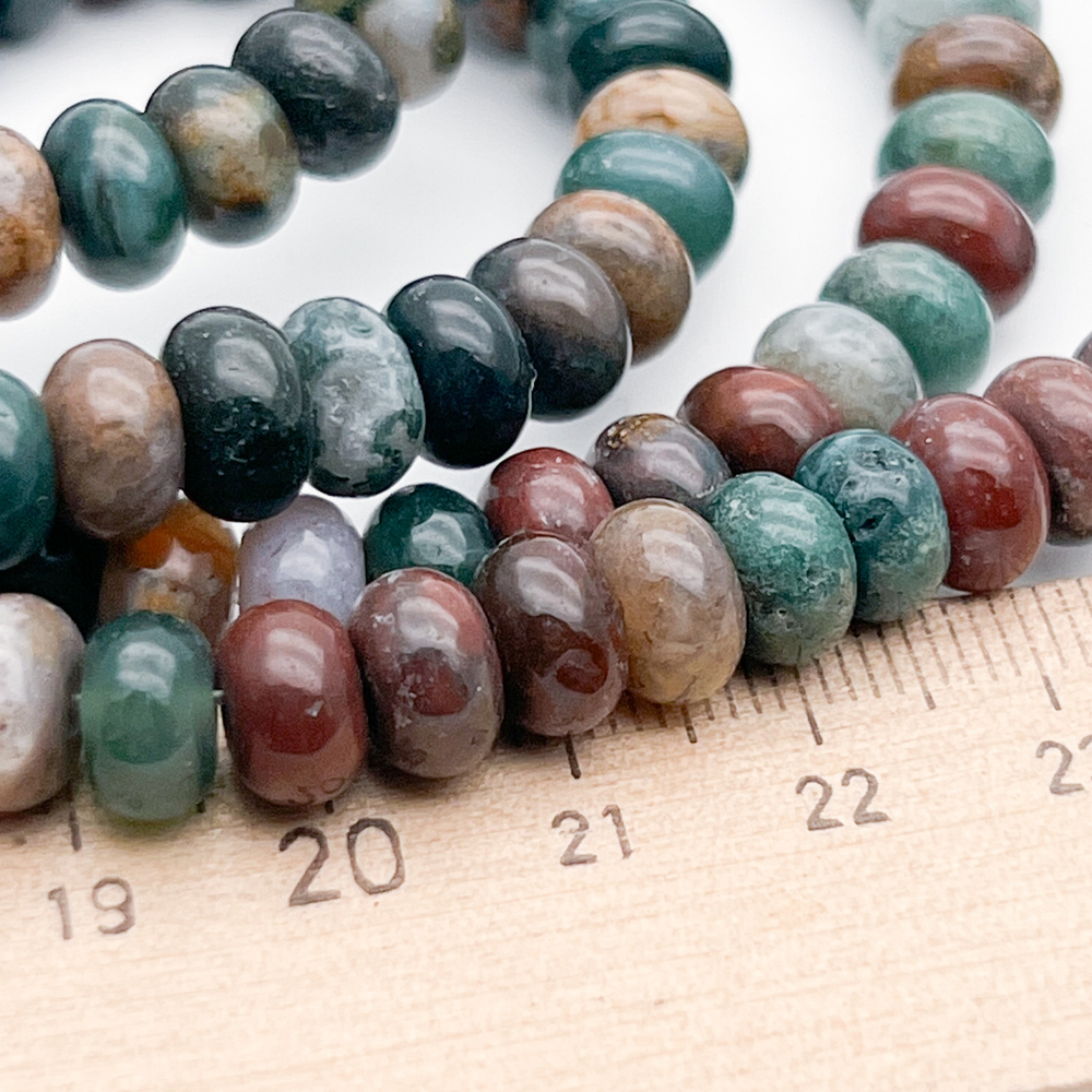 "Индийский агат" бусины (халцедон), размер около 5*8 мм, цена за 17-18 шт (1/4 нити)