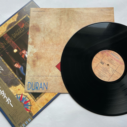 Винтажная виниловая пластинка LP Duran Duran Seven And The Ragged Tiger (Япония 1983) (Оби)