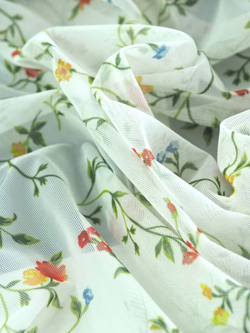 Сетка эластичная белая с зеленым цветочным принтом метражом