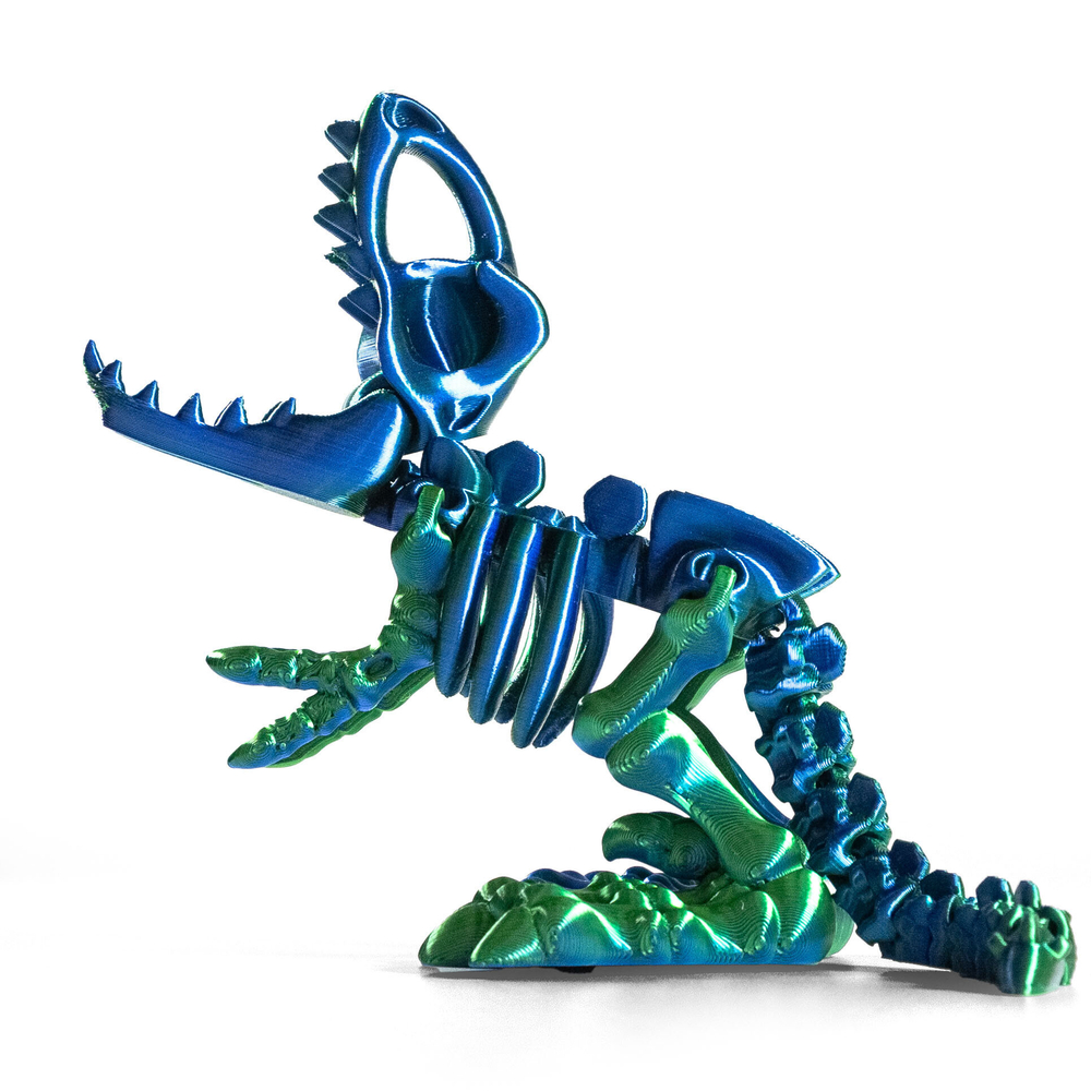 Динозавр-скелет Ти-Рекс (T-rex Dino) с косточкой, гибкая фигурка, сине-зеленый