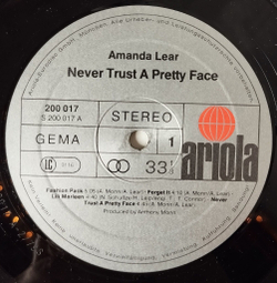 Винтажная виниловая пластинка LP Amanda Lear Never Trust A Pretty Face (Germany 1979) Black Holes