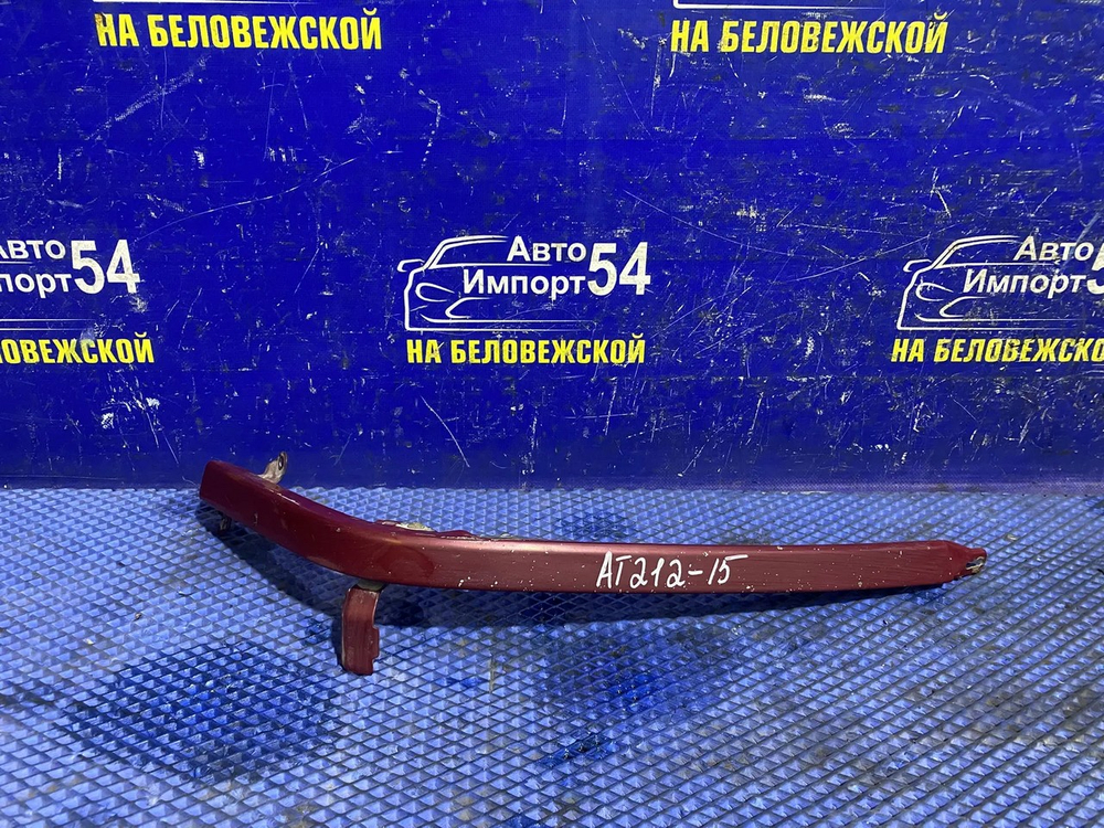 Планка под фару правая TOYOTA CARINA 2001