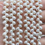 Жемчуг 3А речной бусины Елка 4-6 мм, на нитке 38 см