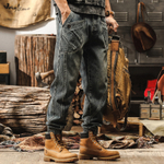 Джинсы мужские с резинками внизу брючина от бренда JIELEINUO