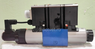4WREE6W16-2X/G24K31/A1V - Пропорциональный распределитель с обратной связью по положению золотника со встроенным усилителем Ду6, A1 = ±10 В, номинальный расход 16 л/мин, схема W