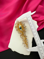 Брошь Schiaparelli