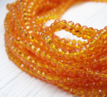 Хрустальные бусины "рондель", комплект из трех цветов: желтый, оранжевый, ярко-рыжий, размер: 2х3 мм, общее количество: 290-300 бусин.