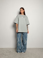 Джинсы с гранжевым эффектом голубые