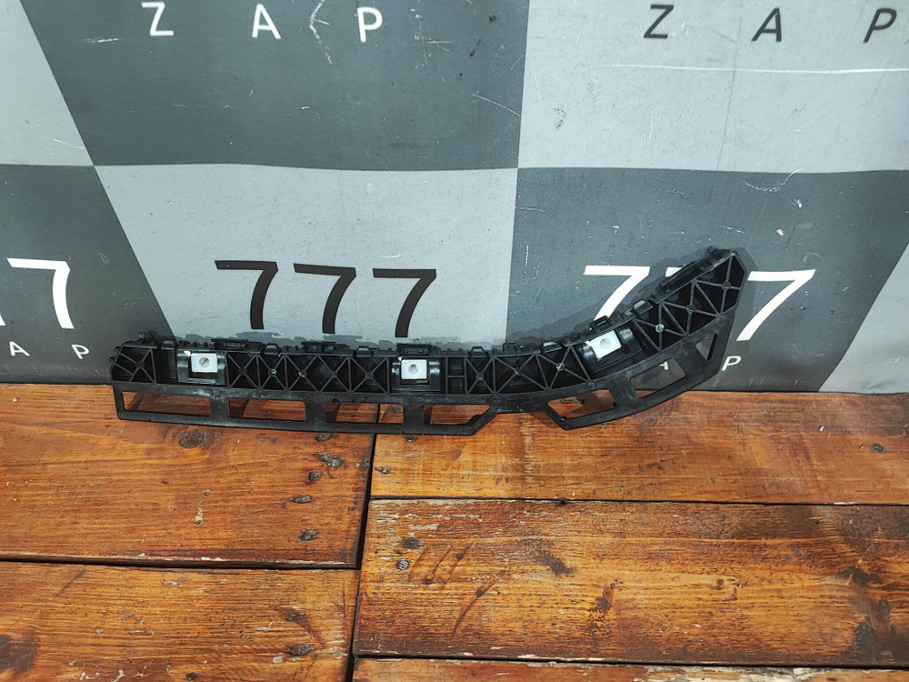 Кронштейн бампера задний правый Kia Rio 3 новый 866144Y500