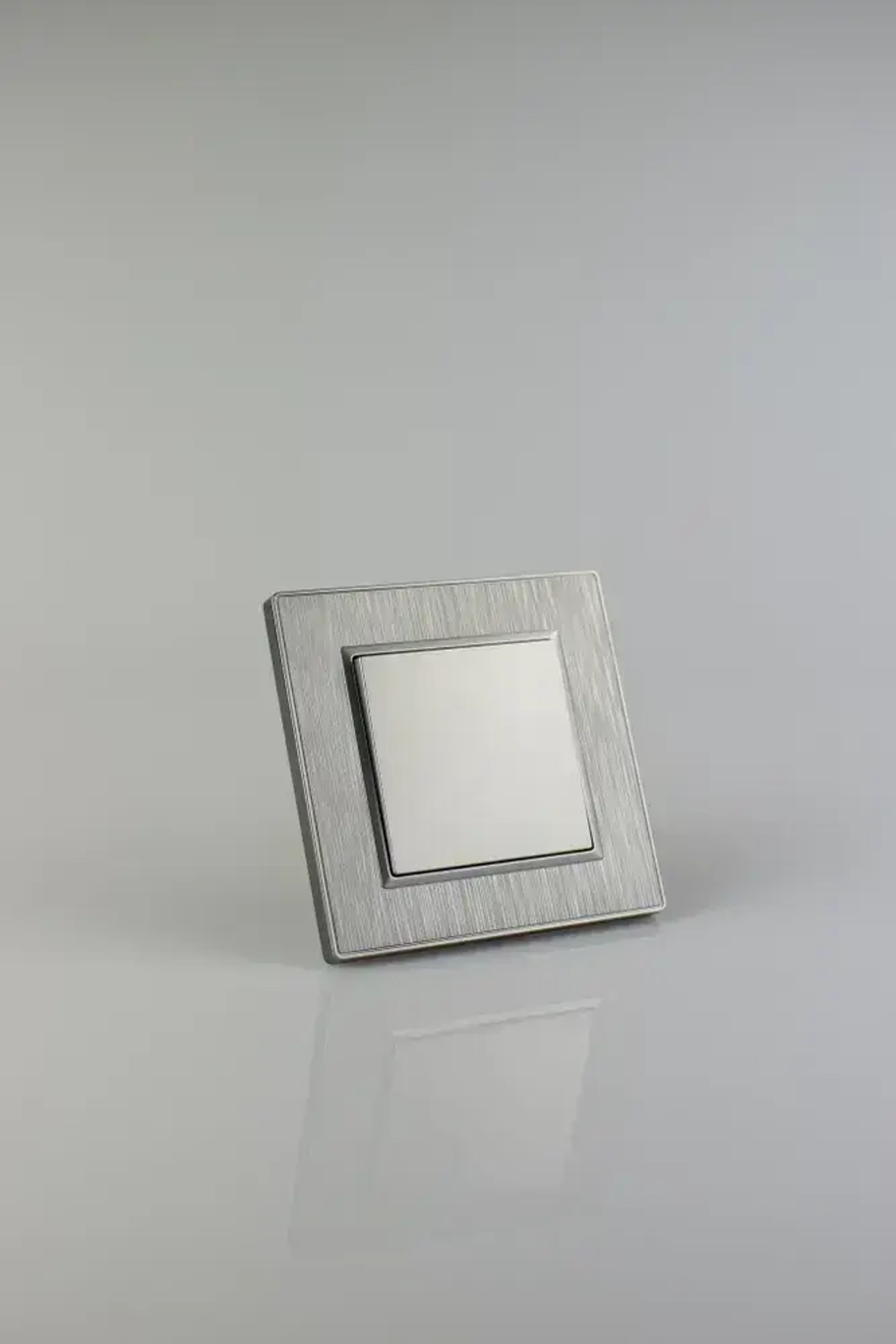 Выключатель одноклавишный серый