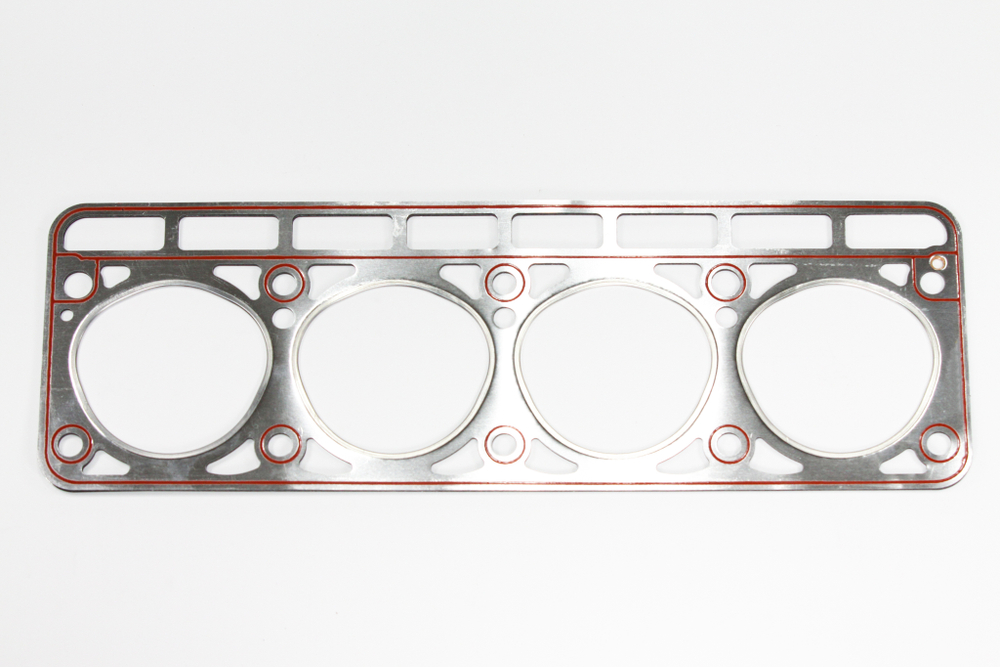 Прокладка ГБЦ ЗМЗ-402 а/м ГАЗ треугольные отверстия (d=92) с герм. облицованная металлом для ДВС на газовом топливе (БЦМ)