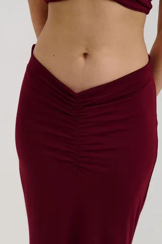 Юбка с драпировкой на бедрах из вискозы цвета бордо