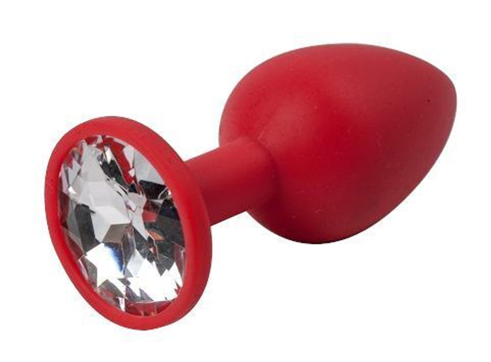 Красная силиконовая анальная пробка с прозрачным стразом - 7,1 см. (Цвет: прозрачный)