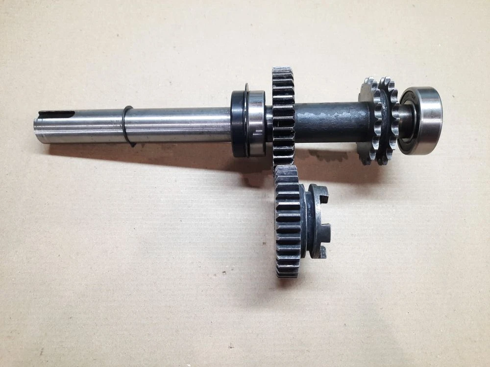 Вал вторичный в сборе L=267мм + шестерня Z=34 (для КПП Revers Box)