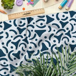 Ткань штапель синие треугольные узоры на голубом фоне