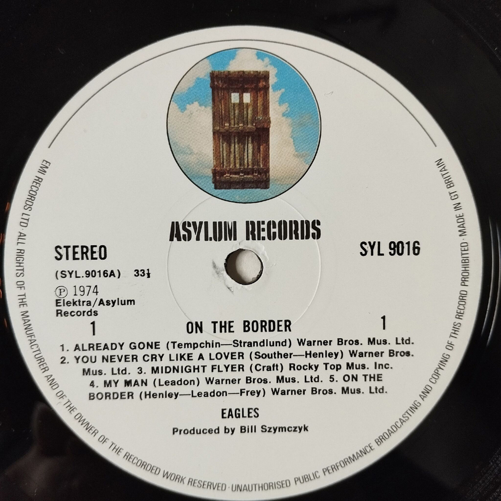 Винтажная виниловая пластинка LP Eagles On The Border (UK 1974)