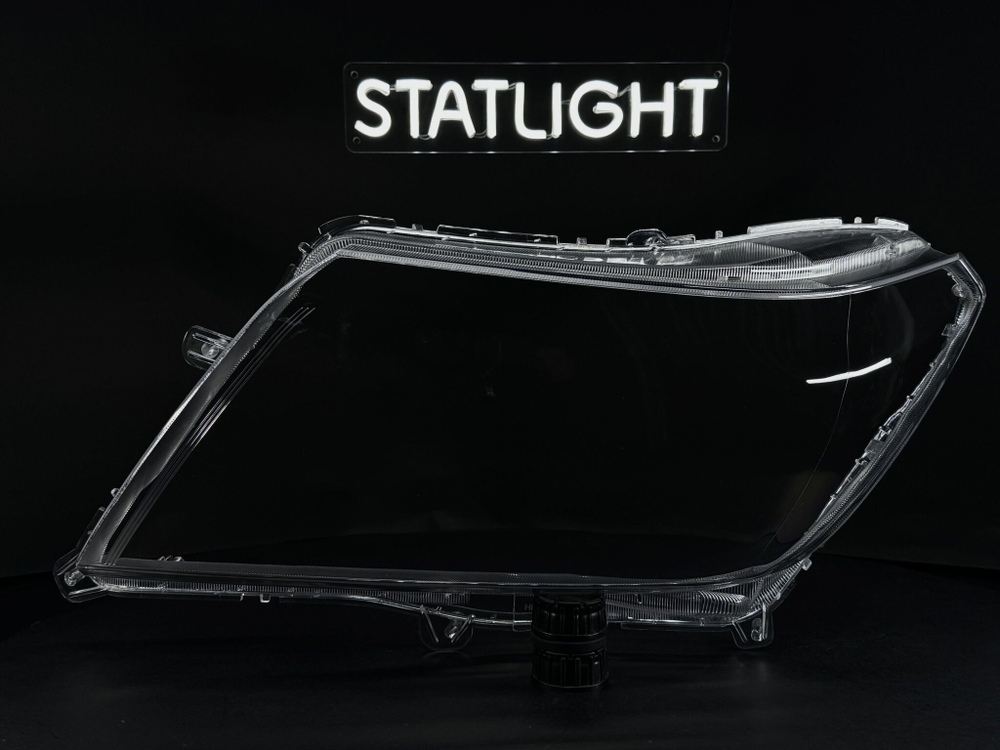 Левое стекло фары Nissan Navara Frontier 2014-н.в.