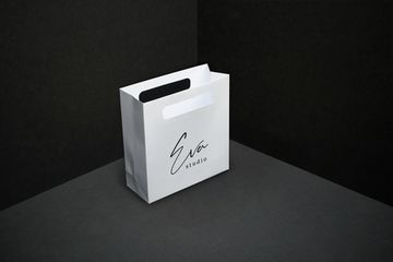 Пакет из мелованной бумаги с вырубными ручками с логотипом заказчика 16х15х6 (в*ш*г)