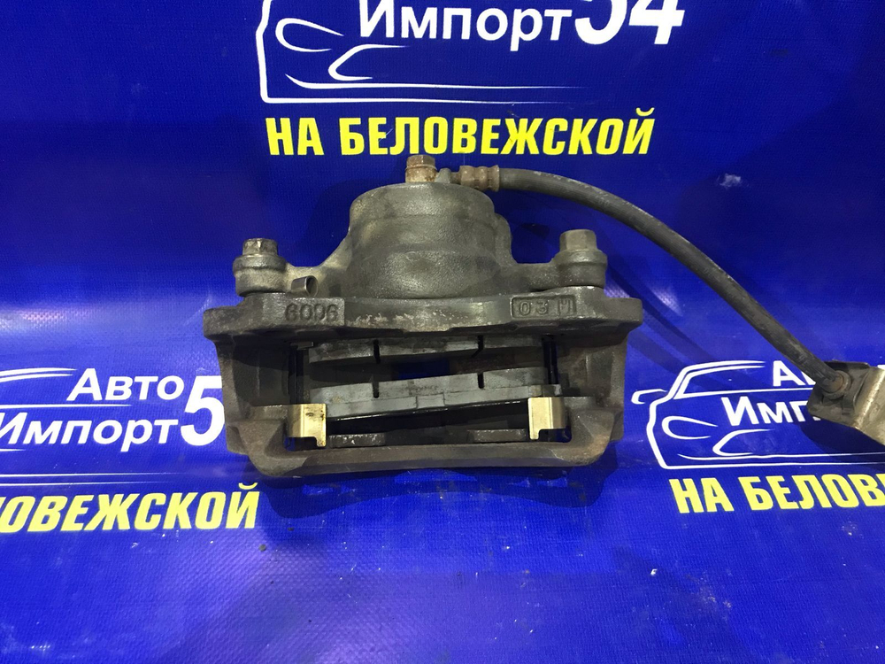Суппорт тормозной передний правый MITSUBISHI DION 2002