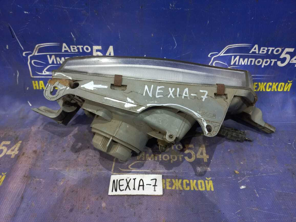 Фара передняя левая DAEWOO NEXIA 1998